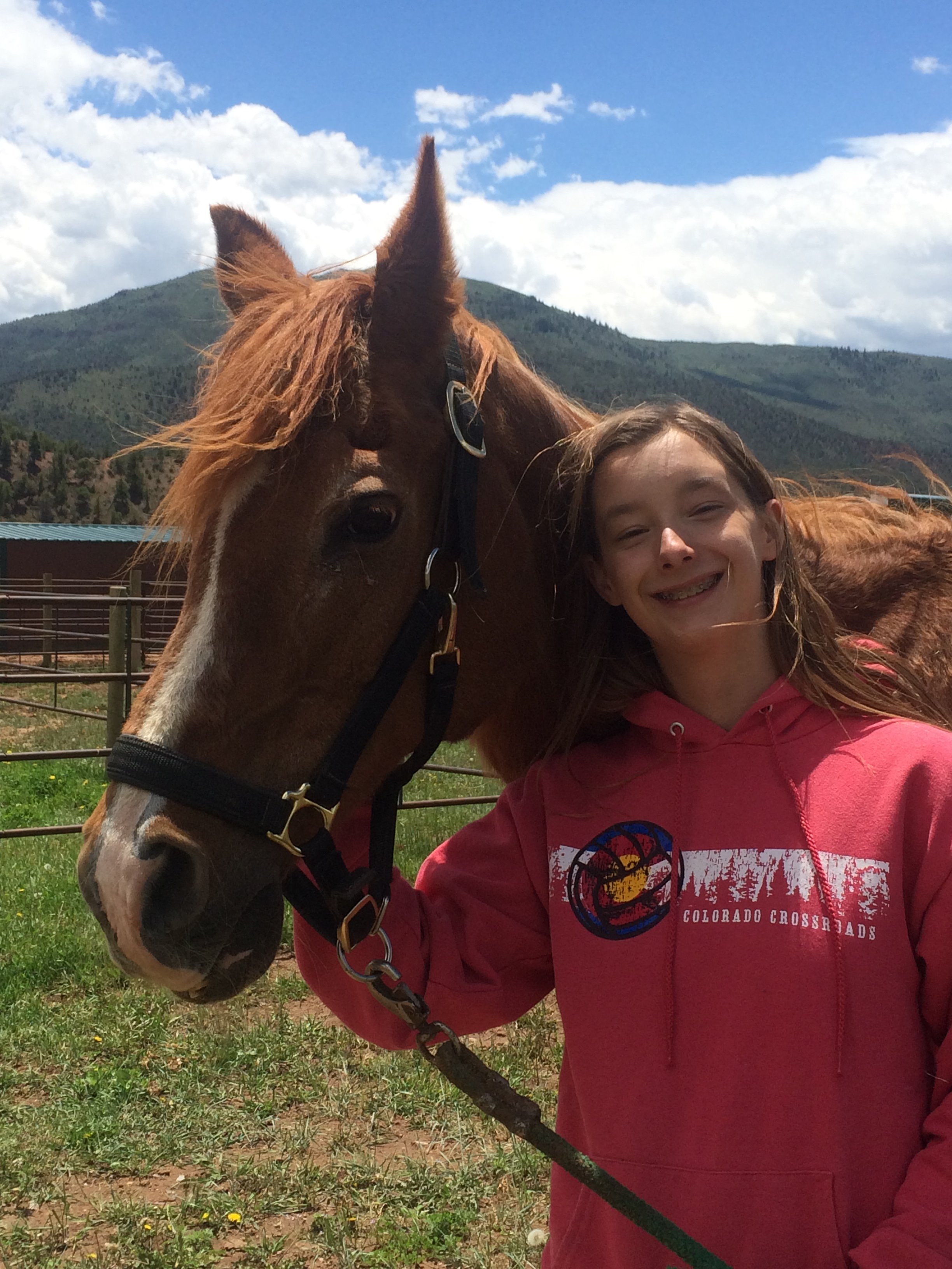 High School Rescue Club member with horse